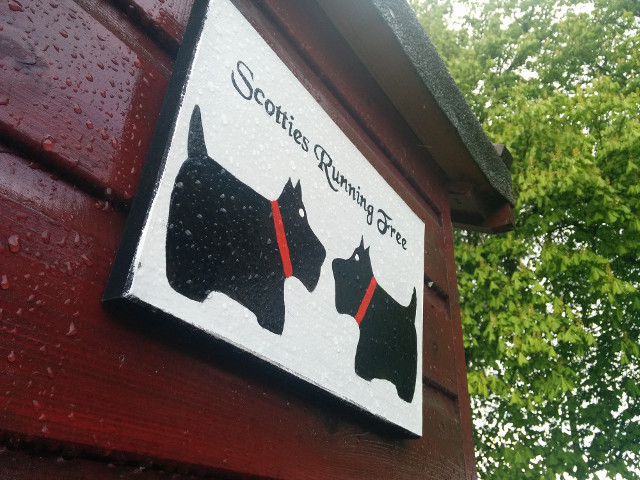 Scottie sign on the workshop